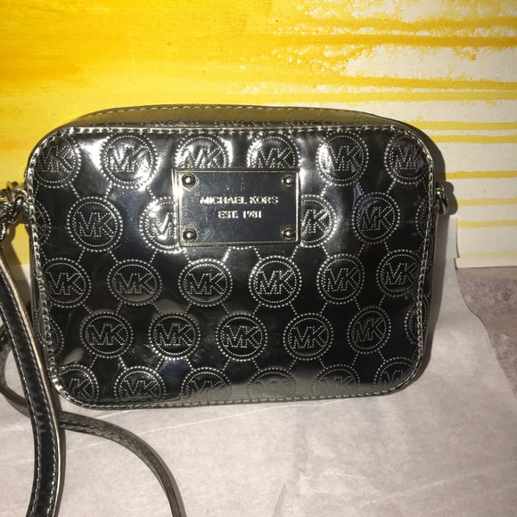Michael Kors Handbags - Michael kors pewter metallic small bag preloved